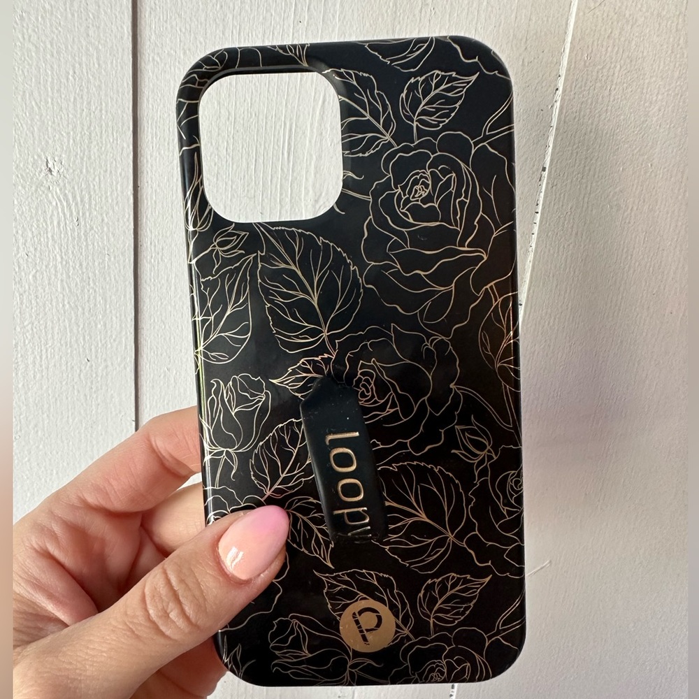 iPhone 12 Pro loopy case. Gold floral design on black. Very gently used.